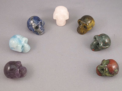 7 CRYSTAL SKULLS