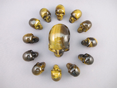 13 CRYSTAL SKULLS