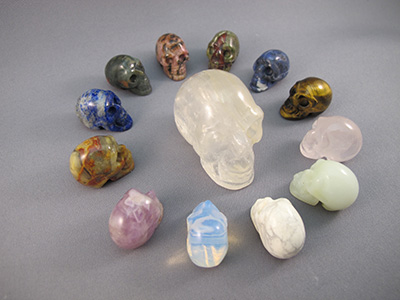 13 CRYSTAL SKULLS